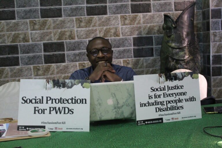 Aaron advocating for the rights of Persons with Disabilities in a Consultative Forum.