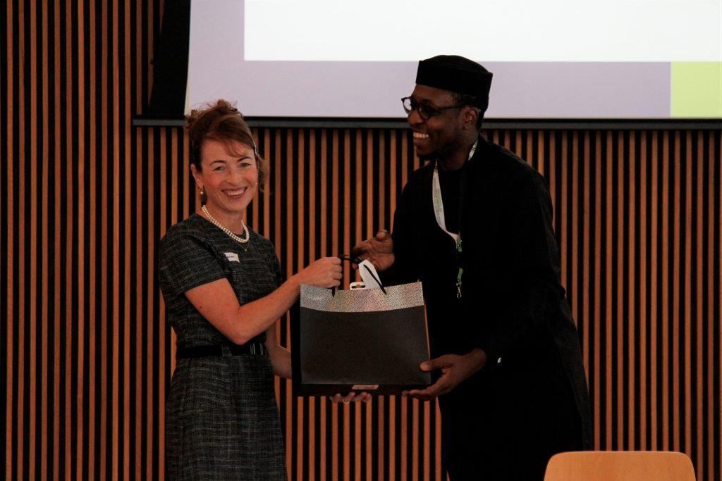 AAP (as of the Chair Scientific Committee) presenting a gift to Prof. Sharon Bentley on behalf of the IM2021 Committee